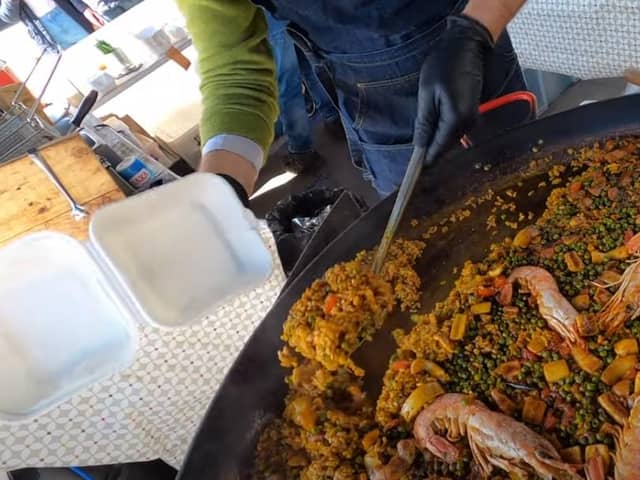A portion of paella is served up from the Leith Walk pop-up venue. Picture: Ruairidh Mason