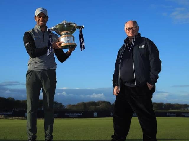 England's Aaron Rai, left, won the last staging of the Aberdeen Standard Investments Scottish Open under its current contract but Aberdeen Standard Life chairman Sir Douglas Flint, right, was hopeful a new deal could be struck for the Rolex Series event and that has indeed been the case. Picture: Andrew Redington/Getty Images