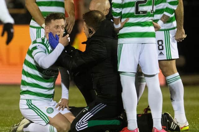 Callum McGregor is forced off with a head injury in the 2-1 Scottish Cup fourth round win. (Photo by Craig Foy / SNS Group)