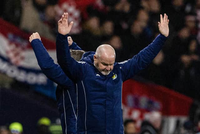 Scotland head coach Steve Clarke and assistant John Carver celebrate as John McGinn finds the net to seal a 1-0 win over Croatia. (Photo by Craig Williamson / SNS Group)