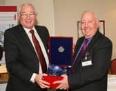 Bill Taylor (right) with his presentation from Provost Jim Leishman