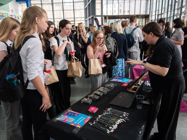 Young people engaging with stallholders at YPI National Event 2025