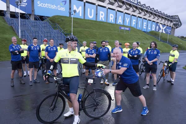Scottish rugby legend Kenny Logan (on bike) and Ally McCoist (right) prior to setting off from Murrayfield Edinburgh with a team of celebrities on a 700 mile endurance challenge from Edinburgh to Paris to raise money for the charity set up by the late Doddie Weir. Photo: Mark F Gibson/PA Wire