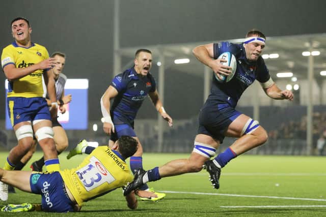 Edinburgh's Tom Dodd scores a try during the friendly win over Bath.