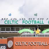 Flags fly at half mast in memory of former Lisbon Lion John Hughes Senior at Celtic Park, on August 02, 2022.