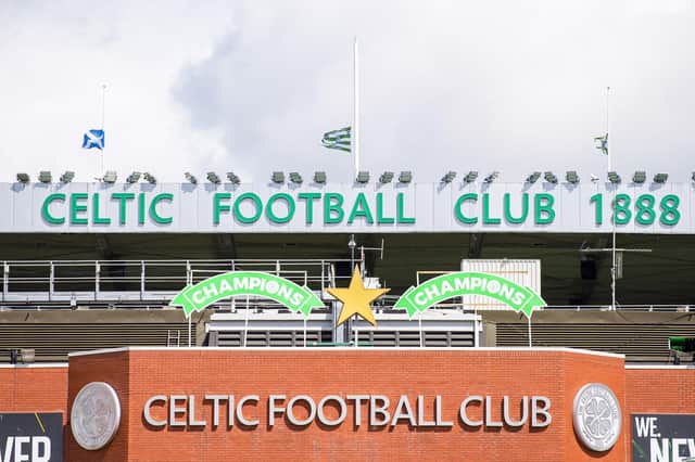 Flags fly at half mast in memory of former Lisbon Lion John Hughes Senior at Celtic Park, on August 02, 2022.