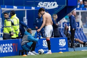 Ianis Hagi gives his shirt to a ballboy after Rangers' 2-1 win over Morton at Ibrox.