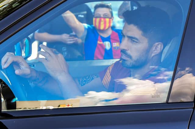 Luis Suarez leaving one of his last Barca training sessions - not he's gone for good.