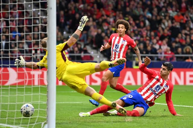 Alvaro Morata slides home Atletico Madrid's second goal against Celtic.