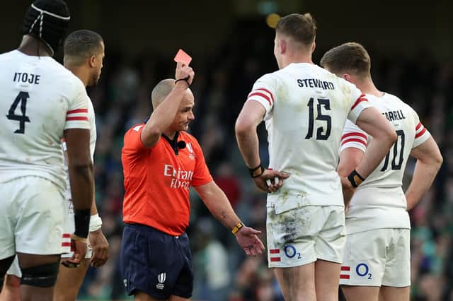 Freddie Steward of England receives a red card from referee Jaco Peyper during the Six Nations Rugby match against Ireland in the Six Nations earlier this year - it was later downgraded to a yellow.
