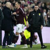 Hearts manager Steven Naismith is pleased that Lawrence Shankland is with the club until the end of the season.