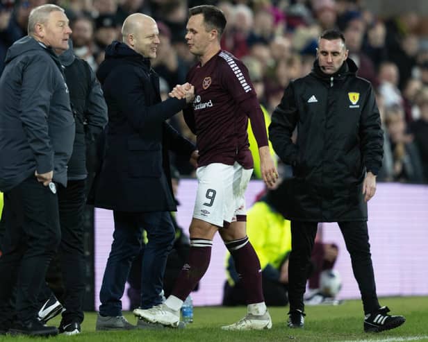 Hearts manager Steven Naismith is pleased that Lawrence Shankland is with the club until the end of the season.
