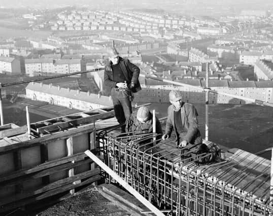 Housing at Castlemilk - Glasgow - Men at work on 20 storey multi flats