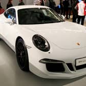 If you see Jim in a white Porsche in Dundee, just give him the thumbs up