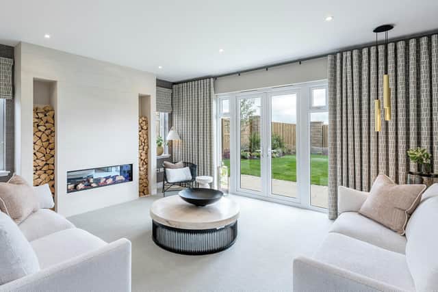 The Ramsya's lounge with bi-fold doors leading to a patio. Image: Chris Humphreys Photography Ltd