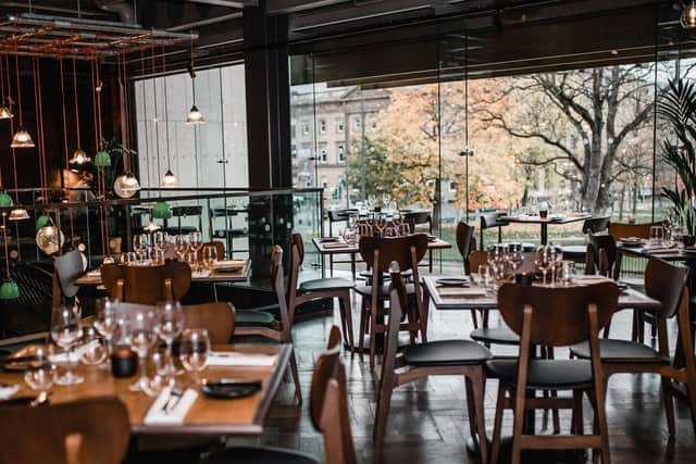 Floor to ceiling windows shine a light on Bread Street Kitchen in St Andrew Square, Edinburgh.