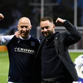 Dundee's Charlie Adam and manager James McPake celebrate at full time at Rugby Park.