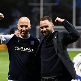 Dundee's Charlie Adam and manager James McPake celebrate at full time at Rugby Park.
