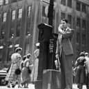 Things have come on since this British salesman suffered in the heat of New York in 1949 but it's still not fun to wear a suit in summer (Picture: Keystone Features / Getty Images)