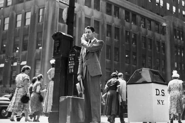 Things have come on since this British salesman suffered in the heat of New York in 1949 but it's still not fun to wear a suit in summer (Picture: Keystone Features / Getty Images)