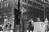 Things have come on since this British salesman suffered in the heat of New York in 1949 but it's still not fun to wear a suit in summer (Picture: Keystone Features / Getty Images)