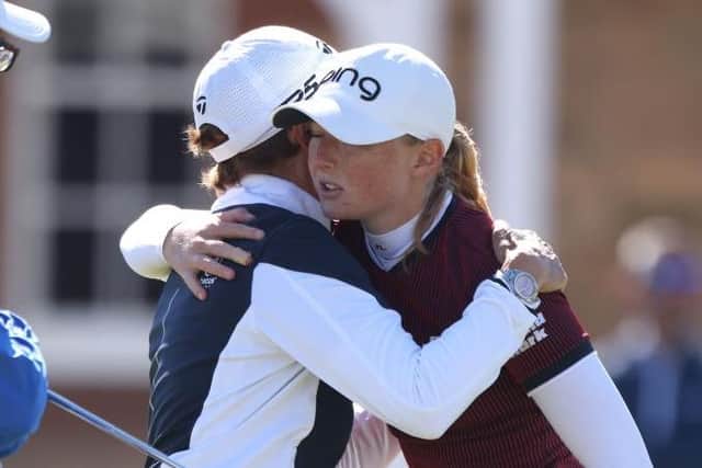 Catriona Matthew and Louise Duncan embrace on the 18th green. Picture: Charlie Crowhurst/Getty Images.