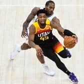 In-form talisman Donovan Mitchell of the Utah Jazz drives in front of LA Clippers' Kawhi Leonard in a closely-fought Western Conference play-off series. Picture: Alex Goodlett/Getty