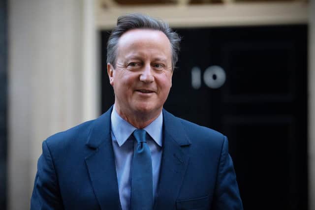 Britain's former prime minister, David Cameron, leaves 10 Downing Street after being appointed foreign secretary in a Cabinet reshuffle. Picture: Getty Images