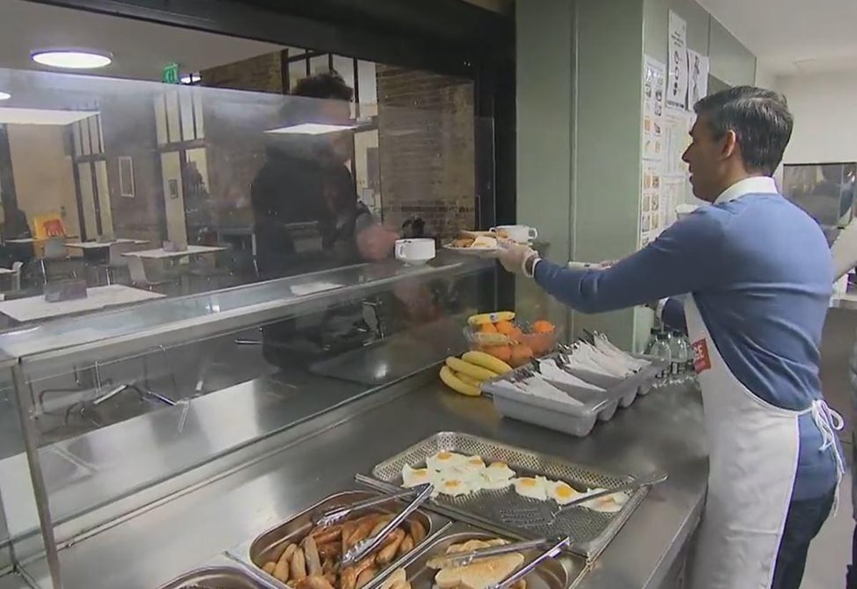 Watch: Rishi Sunak in bizarre exchange as he asks homeless man at shelter if he ‘works in business’