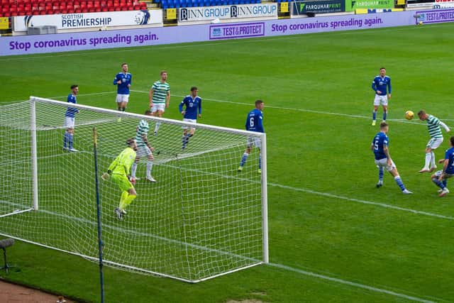 Leigh Griffiths heads home the opening goal in the 90th minute. Picture: SNS