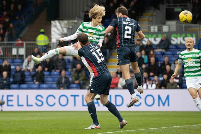 Celtic's Kyogo Furuhashi heads home a 12th minute opener against Ross County. (Photo by Alan Harvey / SNS Group)