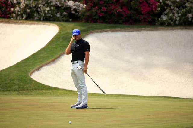 Rory McIlroy reacts after missing a putt on the 13th green during the first round of the Masters at Augusta National. Picture: Mike Ehrmann/Getty Images.