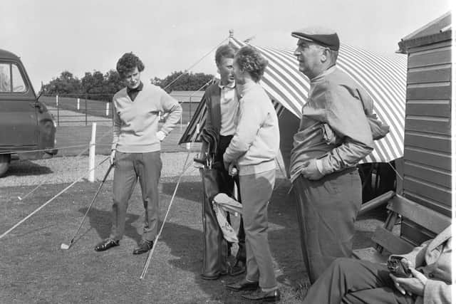 Belle Robertson, left, gets ready for a round in the Babe Zaharias Trophy Tournament in June 1966. Picture: Albert Jordan.