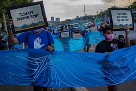 Climate activists take part in a Global Day of Action for Climate Justice protest on Saturday in Manila, Philippines (Picture: Ezra Acayan/Getty Images)