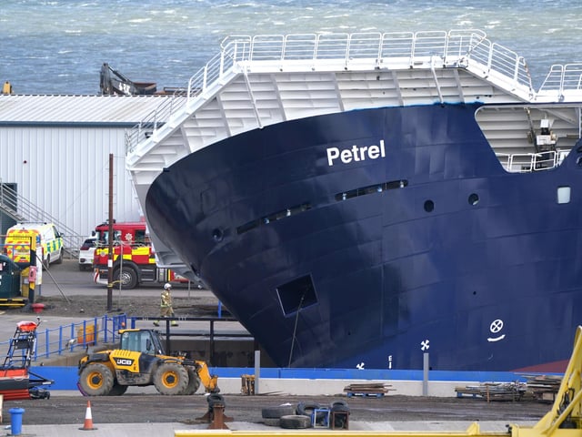 Pictures posted on social media show the vessel leaning at a 45-degree angle.