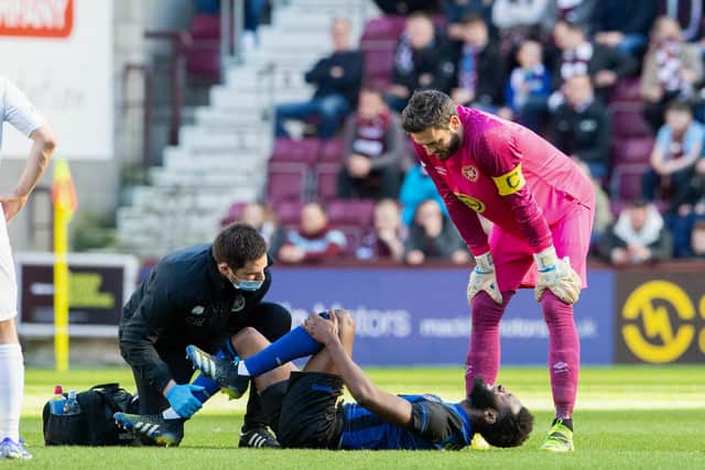 Beni Baningime scored for Hearts but was also forced off due to injury.