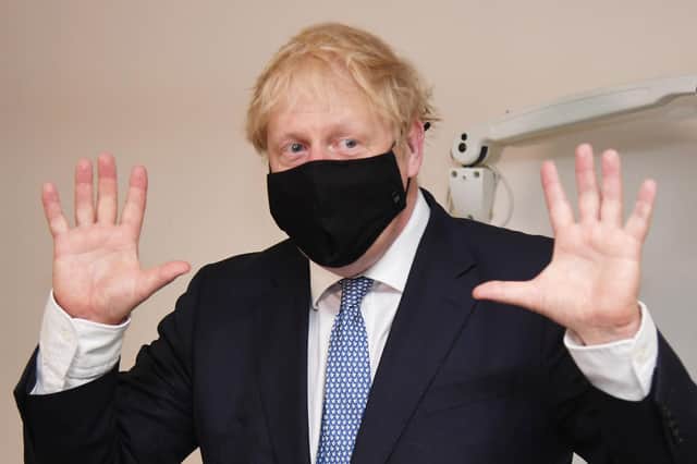 Prime minister Boris Johnson wears a face mask as he visits Tollgate Medical Centre in Beckton on July 24, 2020 in London, England. (Photo by Jeremy Selwyn - WPA Pool/Getty Images)