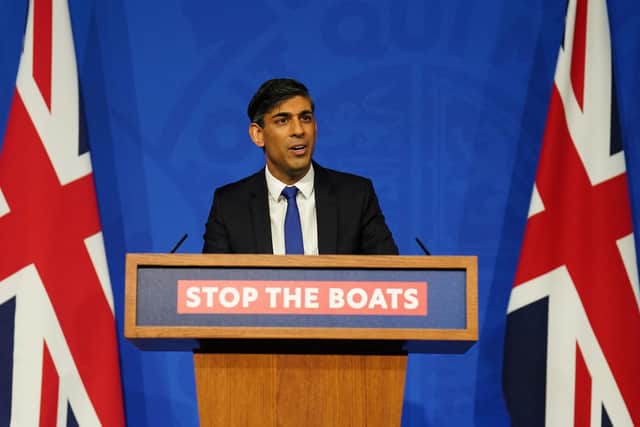 Rishi Sunak hosts a press conference inside the Downing Street Briefing Room on December 7, 202 (Photo by JAMES MANNING/POOL/AFP via Getty Images)
