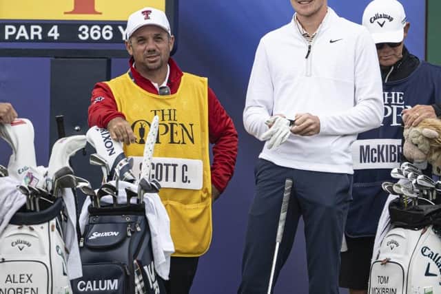 Nairn amateur Calum Scott shares a laugh with his caddie, James Vargas, before teeing off in the second round of the 152nd Open at Royal Troon. Picture: Tom Russo