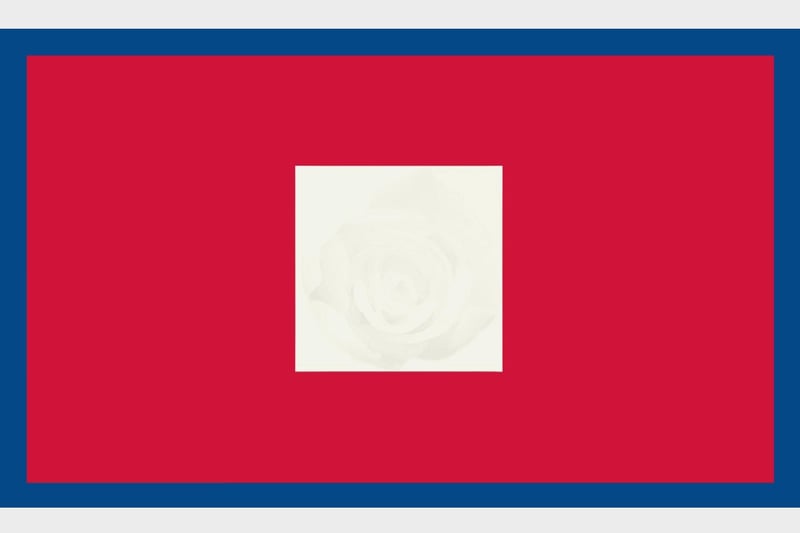 A red flag, surrounded by a blue border, with a white square in the centre containing the White Rose of York. It was raised at Glenfinnan on 19 August, 1745, which signalled the start of the 1745 Jacobite Rising.