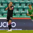 Dylan Vente (R) celebrates after scoring Hibs' second to leave St Mirren's Caolan Boyd-Munce dejected. (Photo by Mark Scates / SNS Group)