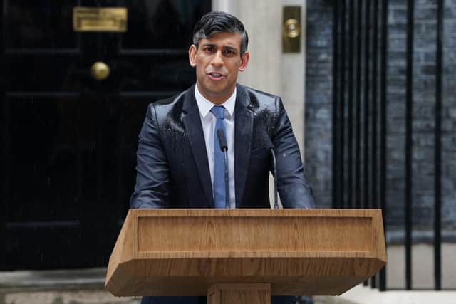 The rain falling on Rishi Sunak as he announced the general election felt like a metaphor to some (Picture: Lucy North/PA)