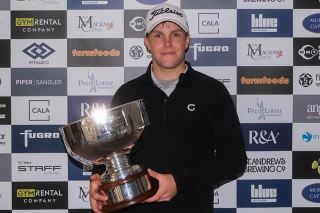 Rory Franssen shows off the trophy after winning the Tartan Pro Tour's Fairmont St Andrews event supported by Martin Gilbert. Picture: Tartan Pro Tour