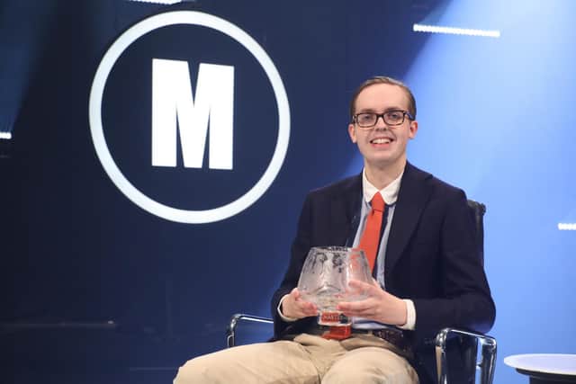 Jonathan Gibson after he became the youngest person to win BBC's Mastermind (PA Media)