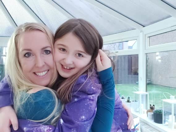 Anna Hendy, suffers from long Covid, with her mother Helen Goss
