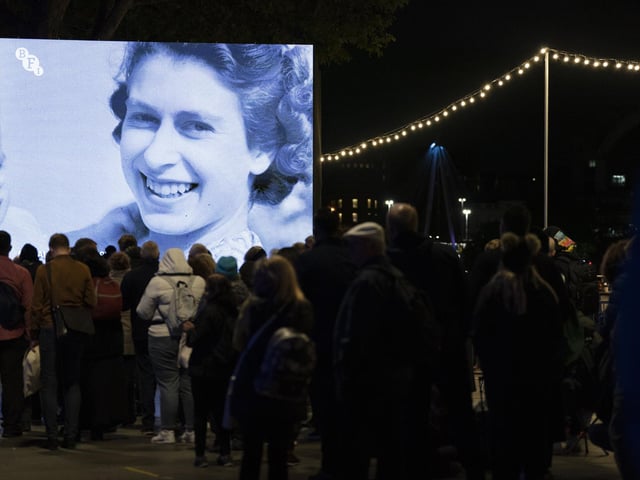 Members of the public in the queue at 04:32 on the South Bank in London, as they wait to view Queen Elizabeth II lying in state ahead of her funeral on Monday. Picture date: Friday September 16, 2022.