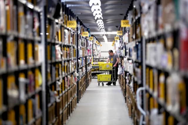 Amazon is to create more than 1,000 apprenticeships across its UK operations which include a major fulfilment centre in Dunfermline, pictured above, pre-Covid. Picture: Jane Barlow/PA