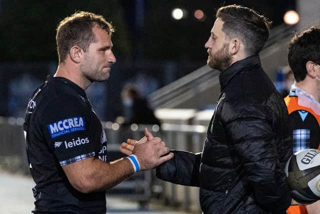Tommy Seymour, who has announced his retirement after 48 tries in 150 games for Glasgow, greets Warriors co-captain Fraser Brown after the win over Leinster. Picture: Craig Williamson/SNS