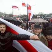 Raman Pratasevich, a prominent opponent of Belarus's authoritarian president , attends an opposition rally in Minsk in 2012 (Picture: AP)