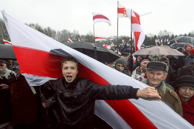 Raman Pratasevich, a prominent opponent of Belarus's authoritarian president , attends an opposition rally in Minsk in 2012 (Picture: AP)